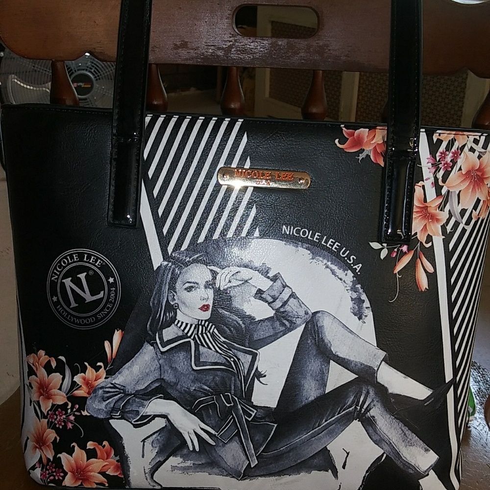 Authentic new without tag Nichole Lee purse